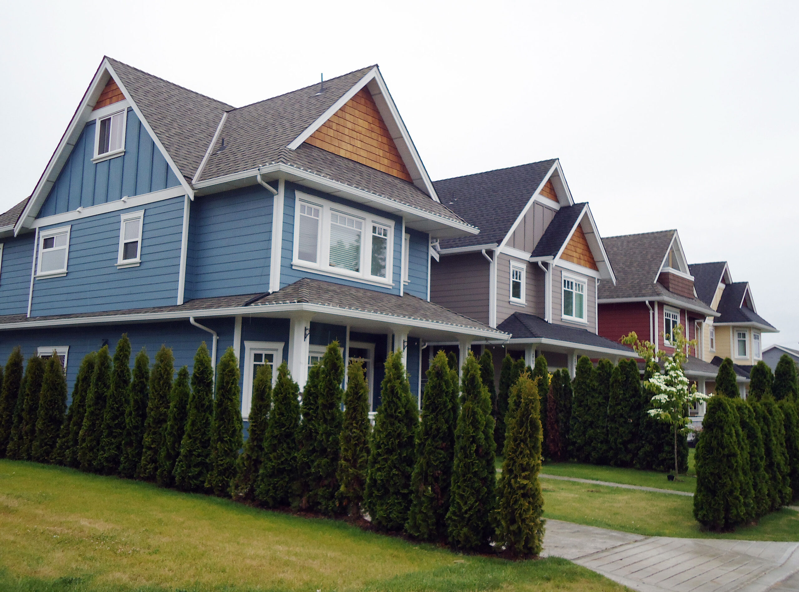 Row of houses with different siding styles